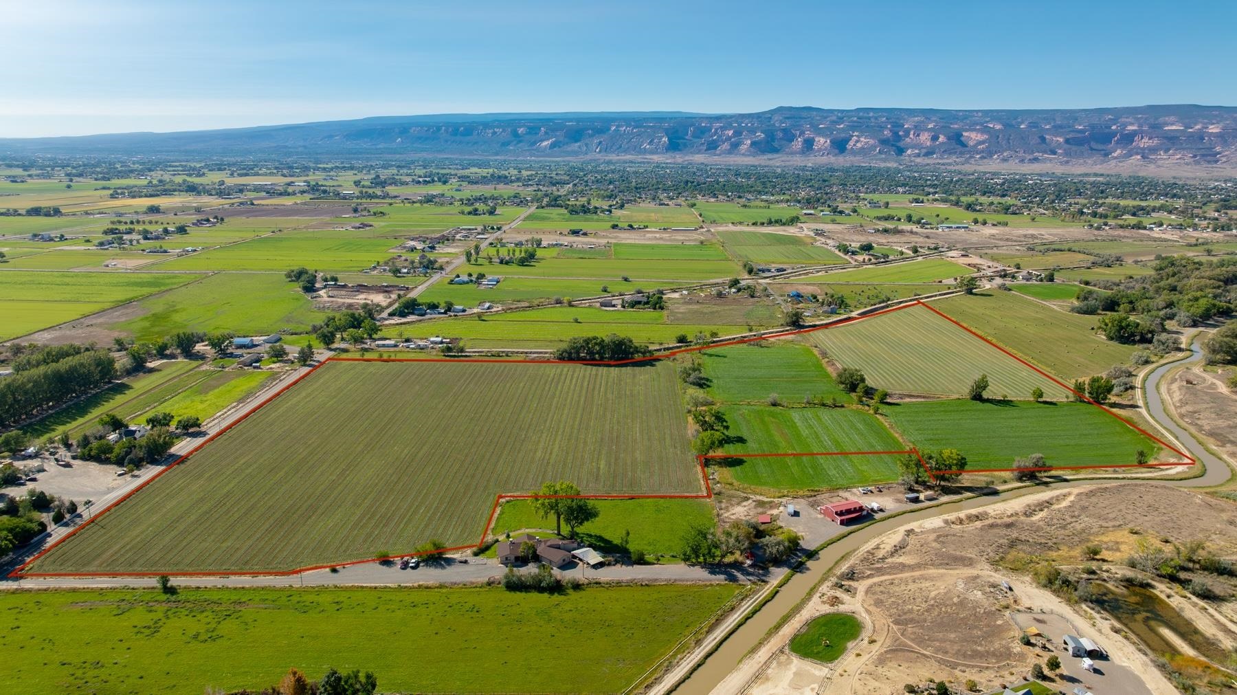 1347 18 1/2 Road Fruita, CO 81521 - Photo 1 of 37 an aerial view of residential houses with outdoor space