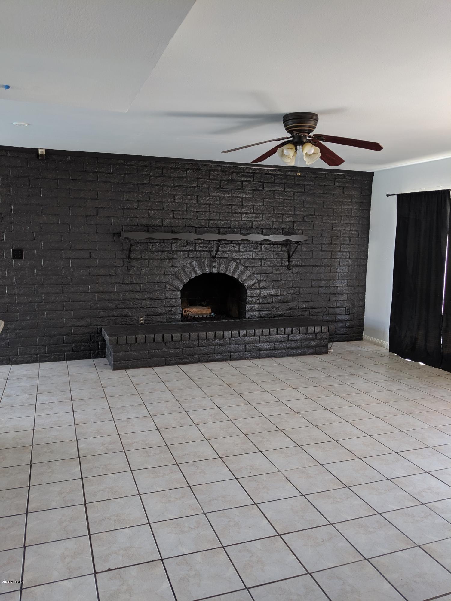 1542 West Darrel Road Phoenix, AZ 85041 - Photo 6 of 17 Fireplace