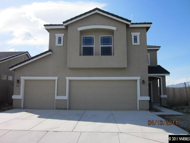 1436 Hagar Road Reno, NV 89506 - Photo 1 of 10 a front view of a house with a yard