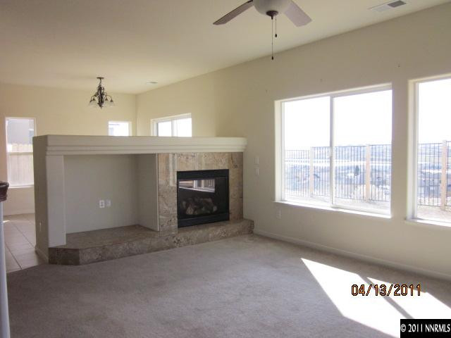 1436 Hagar Road Reno, NV 89506 - Photo 3 of 10 a view of an empty room with a window