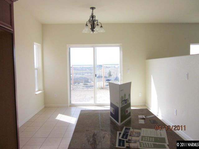 1436 Hagar Road Reno, NV 89506 - Photo 5 of 10 a living room with furniture and a window