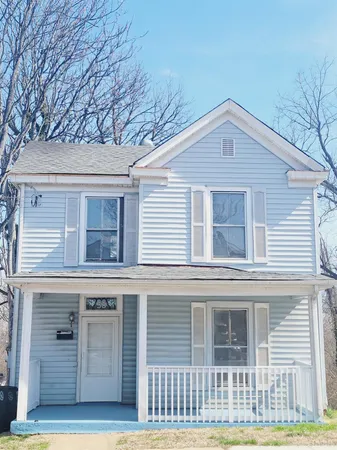 a view of a backyard of the house