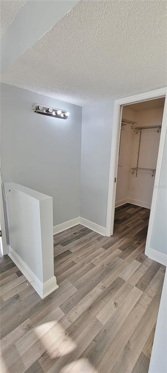 3342 Teeside Drive New Port Richey, FL 34655 - Photo 25 of 45 a view of an empty room with wooden floor and closet