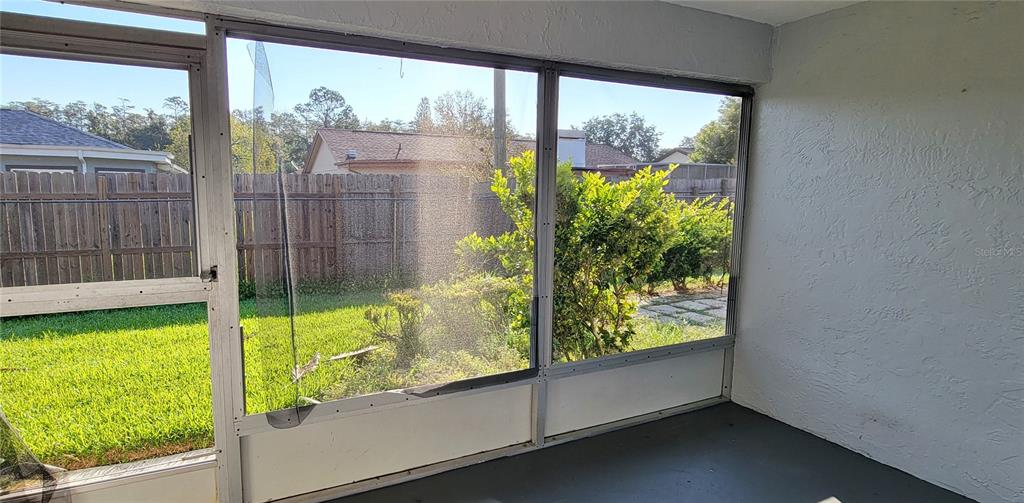 3342 Teeside Drive New Port Richey, FL 34655 - Photo 35 of 45 a view of a garden from a window