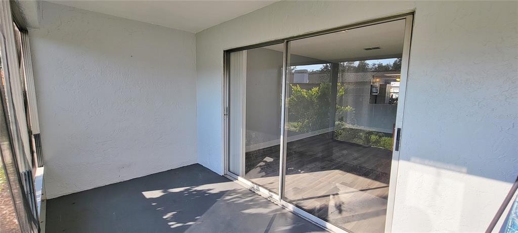 3342 Teeside Drive New Port Richey, FL 34655 - Photo 36 of 45 a bathroom with a glass shower door