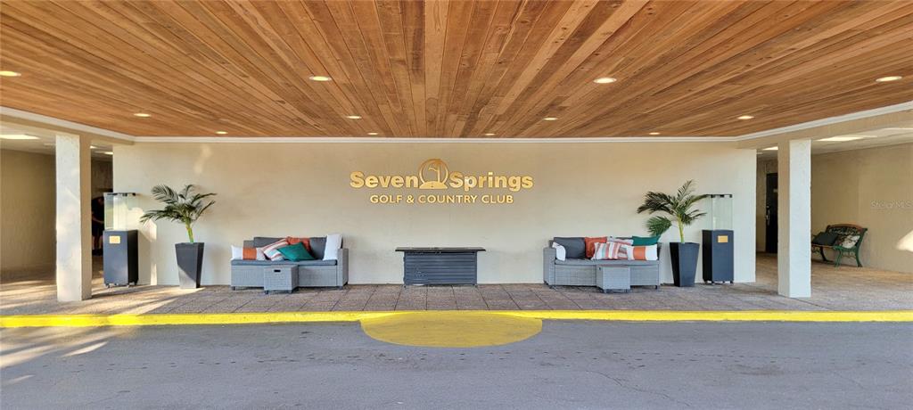 3342 Teeside Drive New Port Richey, FL 34655 - Photo 38 of 45 a swimming pool with a table and chairs