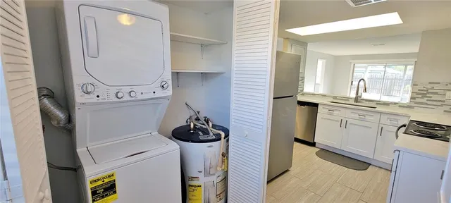 view of a kitchen with appliances and cabinets