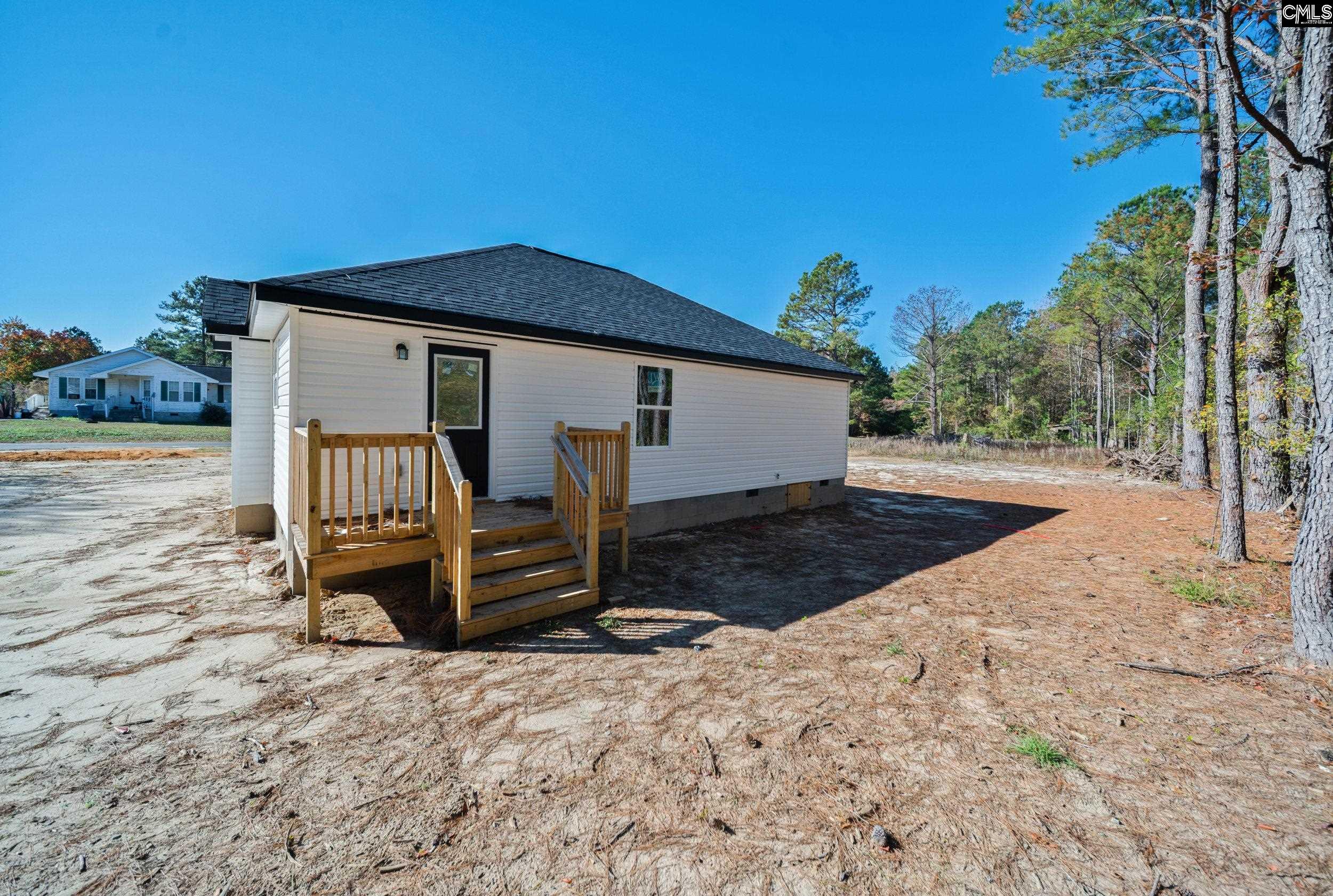 116 Sunny Acres Road Eastover, SC 29044 - Photo 26 of 40 a view of a house with a yard