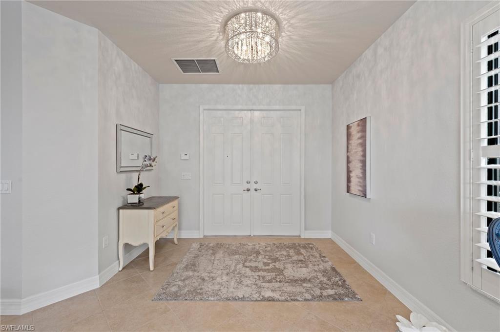 3082 Hudson Terrace Naples, FL 34119 - Photo 11 of 48 a view of an entryway of house