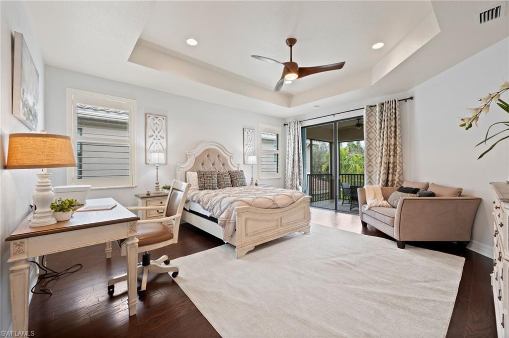 3082 Hudson Terrace Naples, FL 34119 - Photo 26 of 48 a bedroom with a bed window and couch