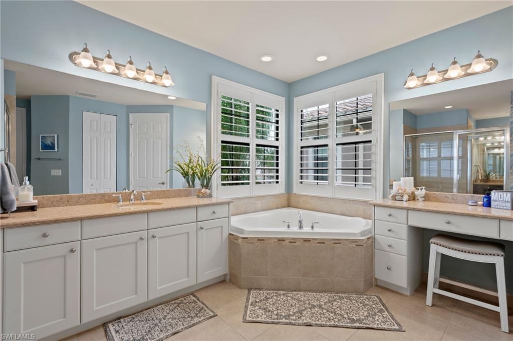 3082 Hudson Terrace Naples, FL 34119 - Photo 31 of 48 a large white kitchen with a large window