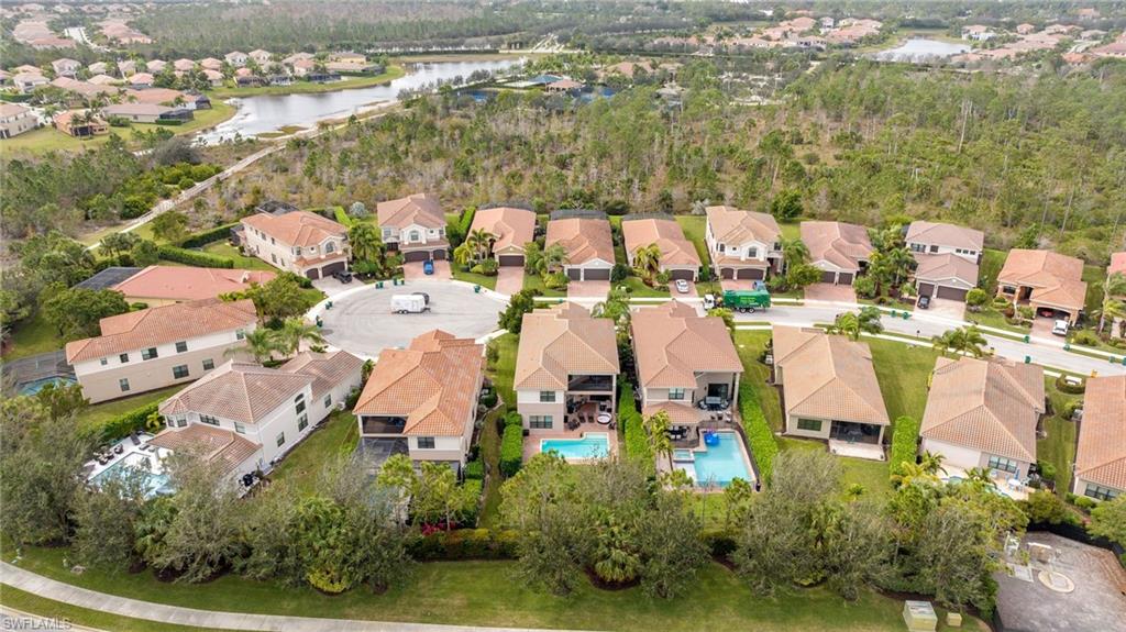 3082 Hudson Terrace Naples, FL 34119 - Photo 7 of 48 an aerial view of residential houses with outdoor space and parking