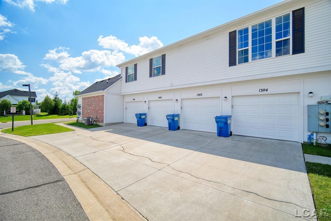 1303 Riversedge Drive Saline, MI 48176 - Photo 4 of 36 50217430-f752ed04-3dd3-4f1b-a5f4-2cbef14452d4.JPG