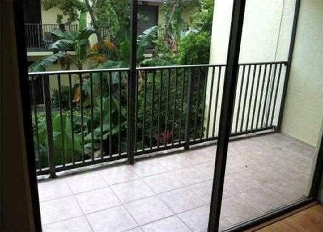 81 Deer Creek Road, Unit J103 Deerfield Beach, FL 33442 - Photo 7 of 8 a view of a balcony