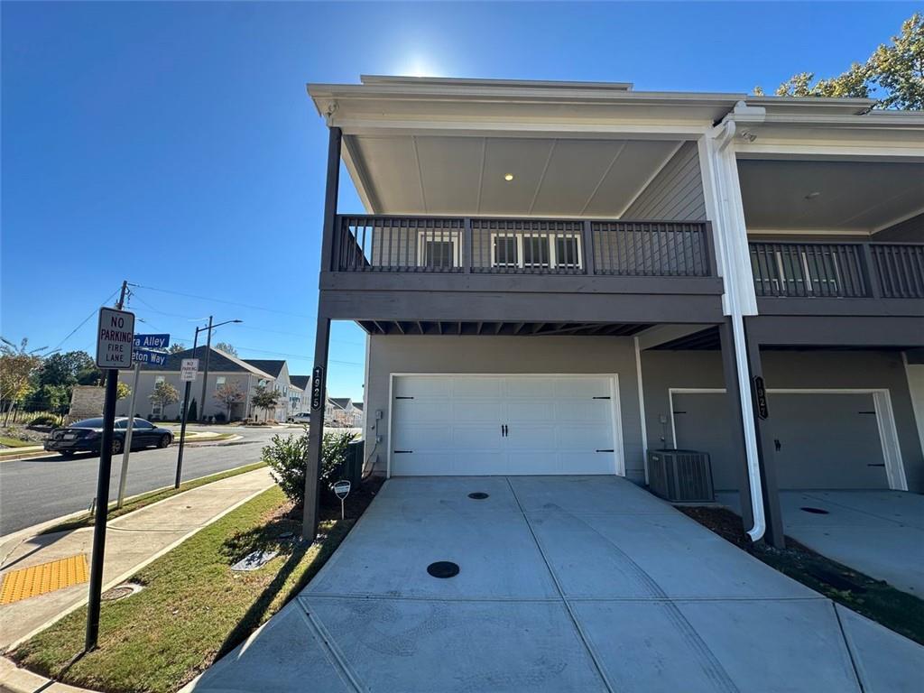 1925 Audra Alley Kennesaw, GA 30144 - Photo 23 of 24 a view of a balcony with cars