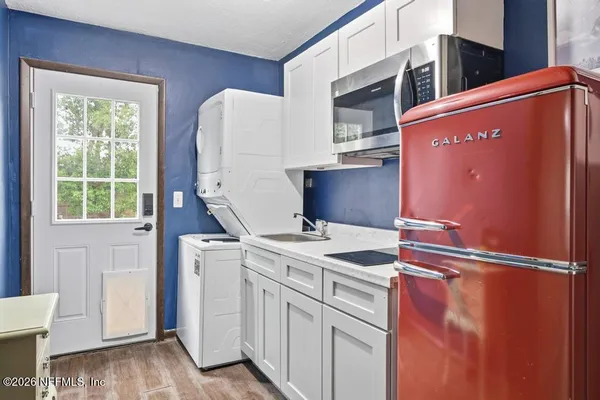 a utility room with dryer and washer