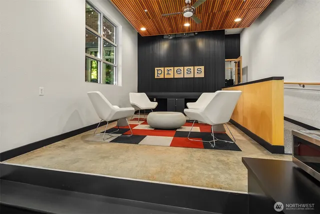 a room with gym equipment and a large window