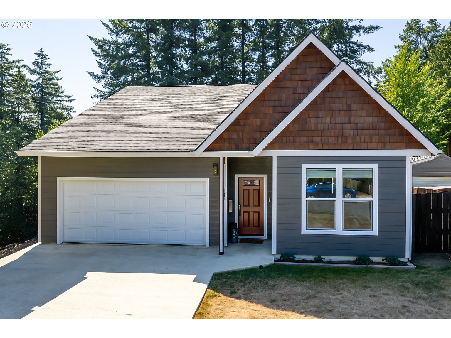 547 West Fourth Street Coquille, OR 97423 - Photo 1 of 48 a front view of a house with a yard
