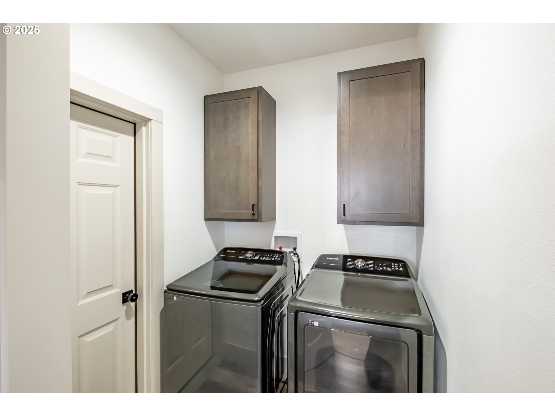 547 West Fourth Street Coquille, OR 97423 - Photo 23 of 48 a kitchen with a stove cabinets and a refrigerator