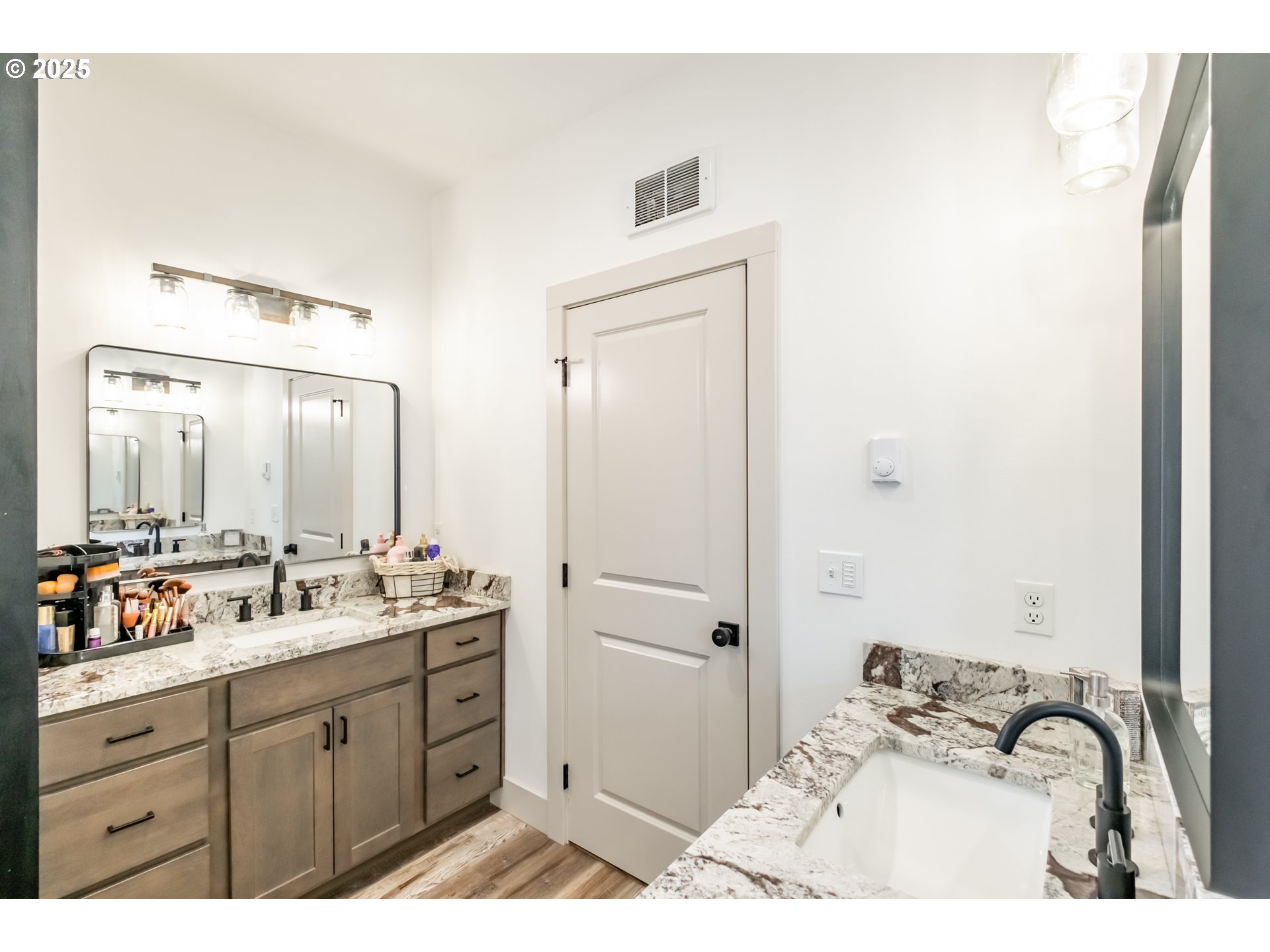 547 West Fourth Street Coquille, OR 97423 - Photo 33 of 48 a bathroom with a sink and a mirror