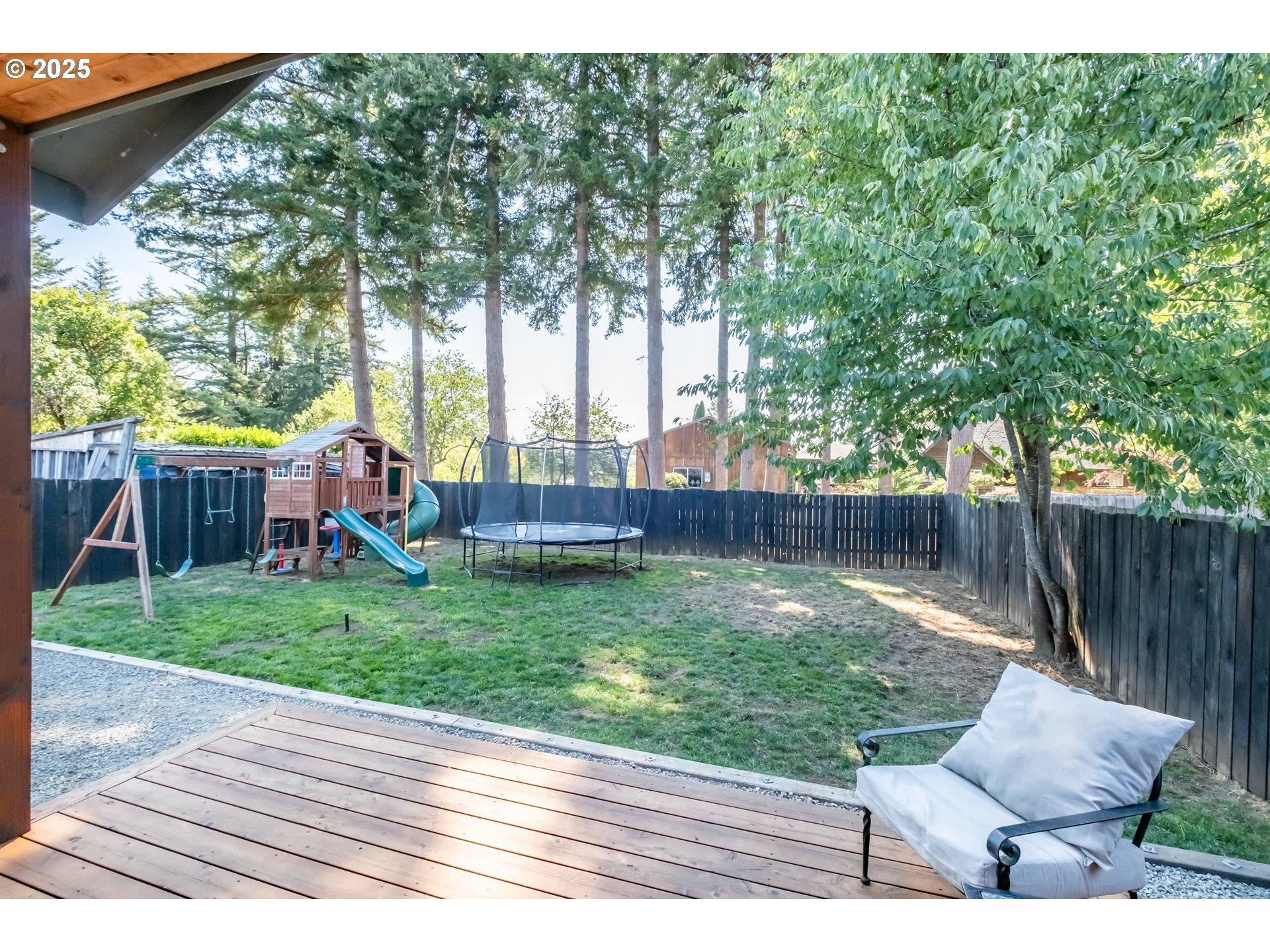 547 West Fourth Street Coquille, OR 97423 - Photo 40 of 48 a backyard of a house with seating space