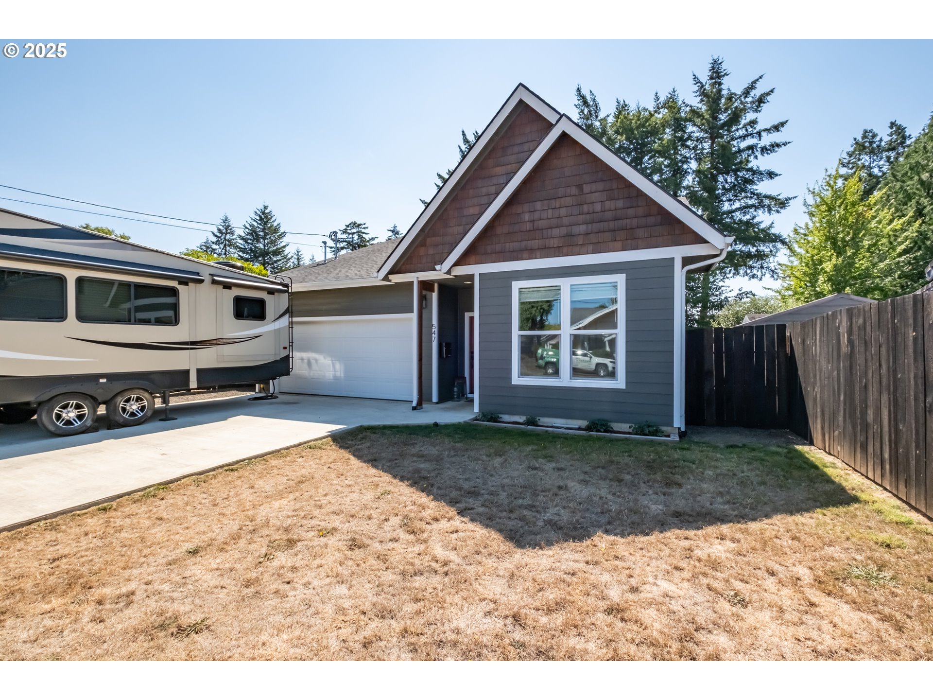 547 West Fourth Street Coquille, OR 97423 - Photo 4 of 48 a view of a house with a yard