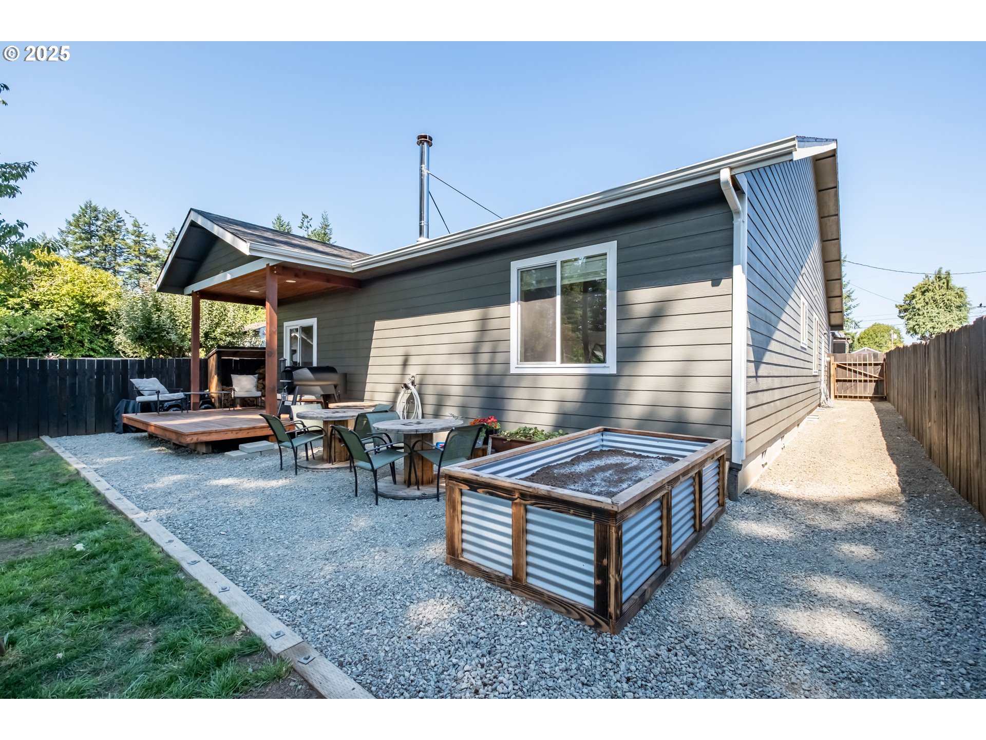 547 West Fourth Street Coquille, OR 97423 - Photo 45 of 48 a view of a backyard with sitting area