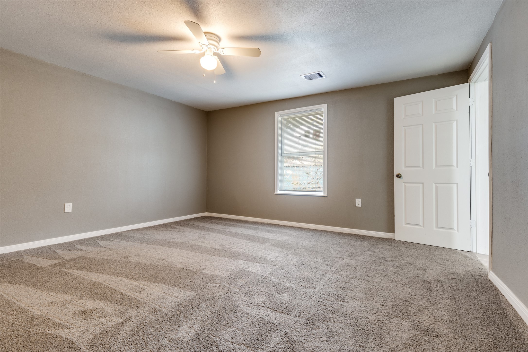 200 Pine Street Prairie View, TX 77446 - Photo 18 of 25 a view of an empty room with a window
