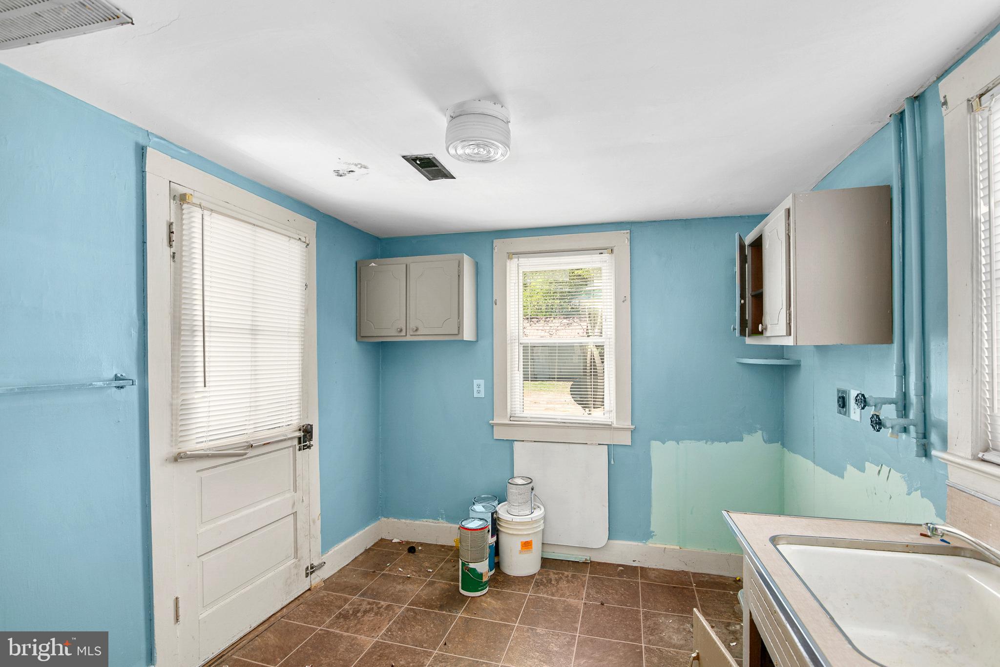 156 Main Street Preston, MD 21655 - Photo 7 of 18 a bathroom with a sink toilet and tub