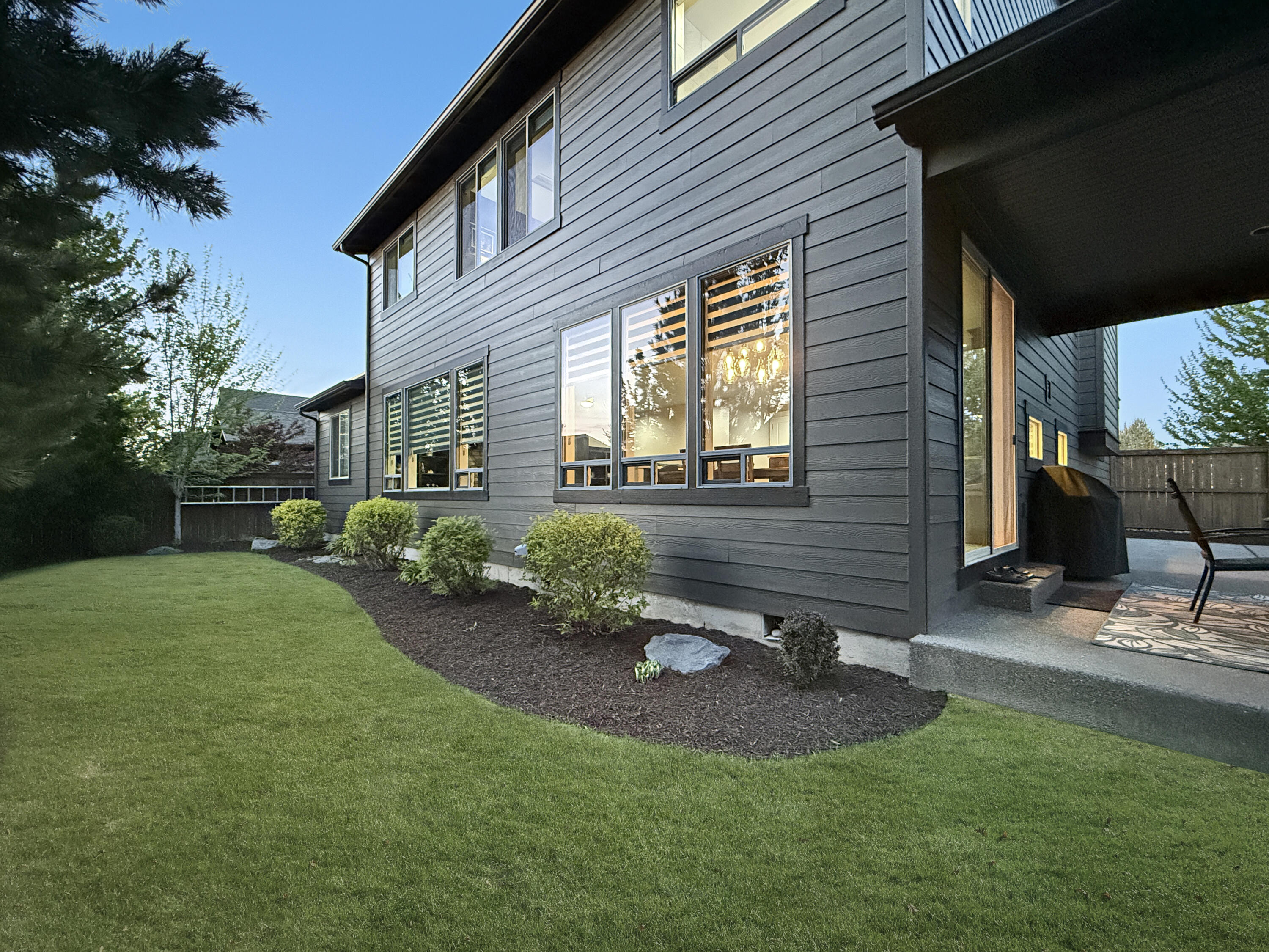 61072 Manhae Loop Bend, OR 97702 - Photo 44 of 63 a front view of a house with garden