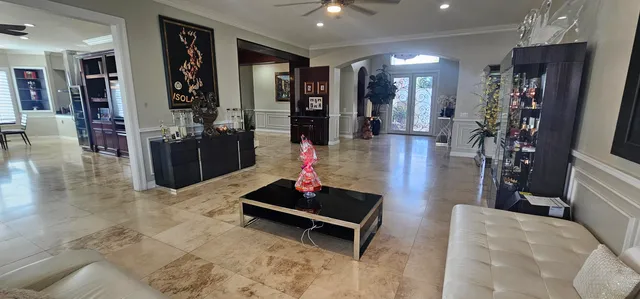 a kitchen with lots of counter top space and living room