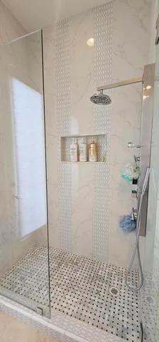 a view of a hallway with stairs