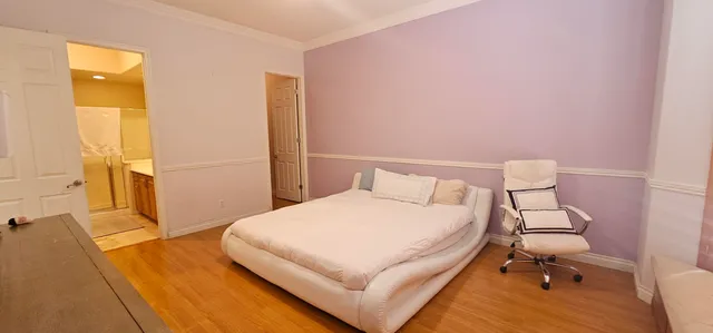 a bathroom with a sink double vanity and a mirror