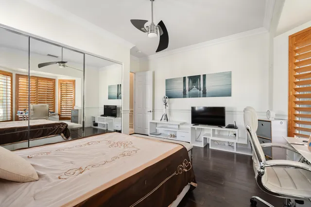 a bathroom with a shower and a sink