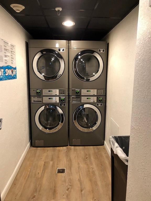 6165 Carrier Drive, Unit 1114 Orlando, FL 32819 - Photo 24 of 31 a view of washer and dryer in a utility room