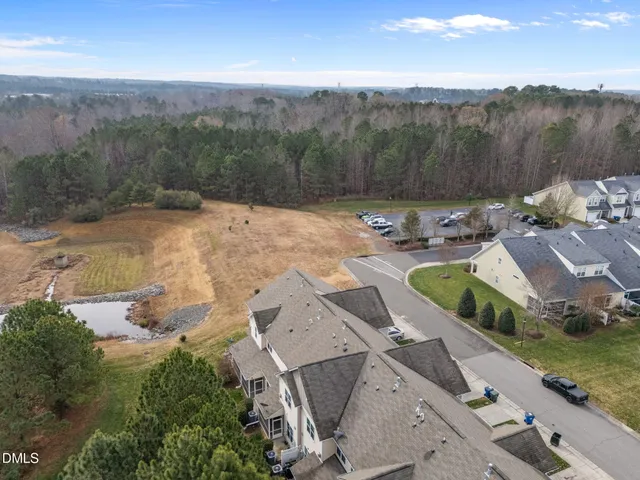 an aerial view of a house with a garden