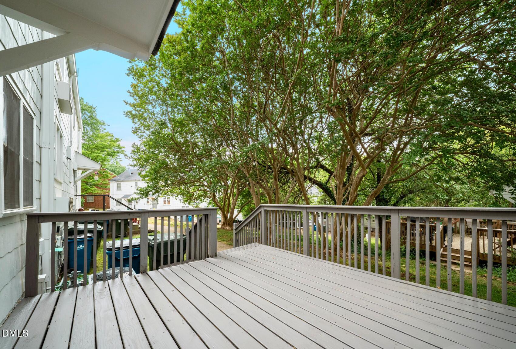 967 St Marys Street Raleigh, NC 27605 - Photo 29 of 34 a view of wooden deck and a garden