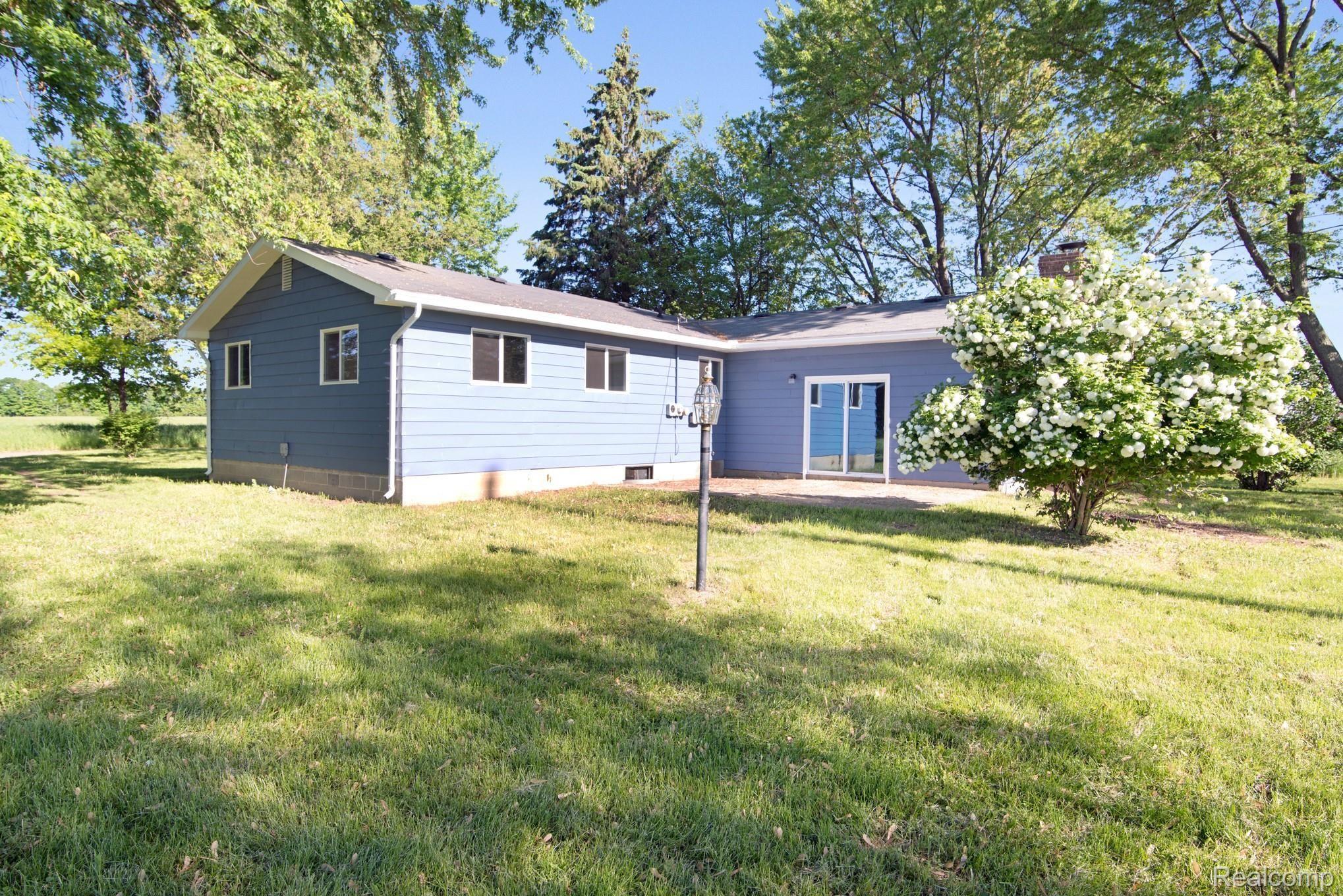 3680 North Gregory Road Fowlerville, MI 48836 - Photo 3 of 24 Back patio off the great room
