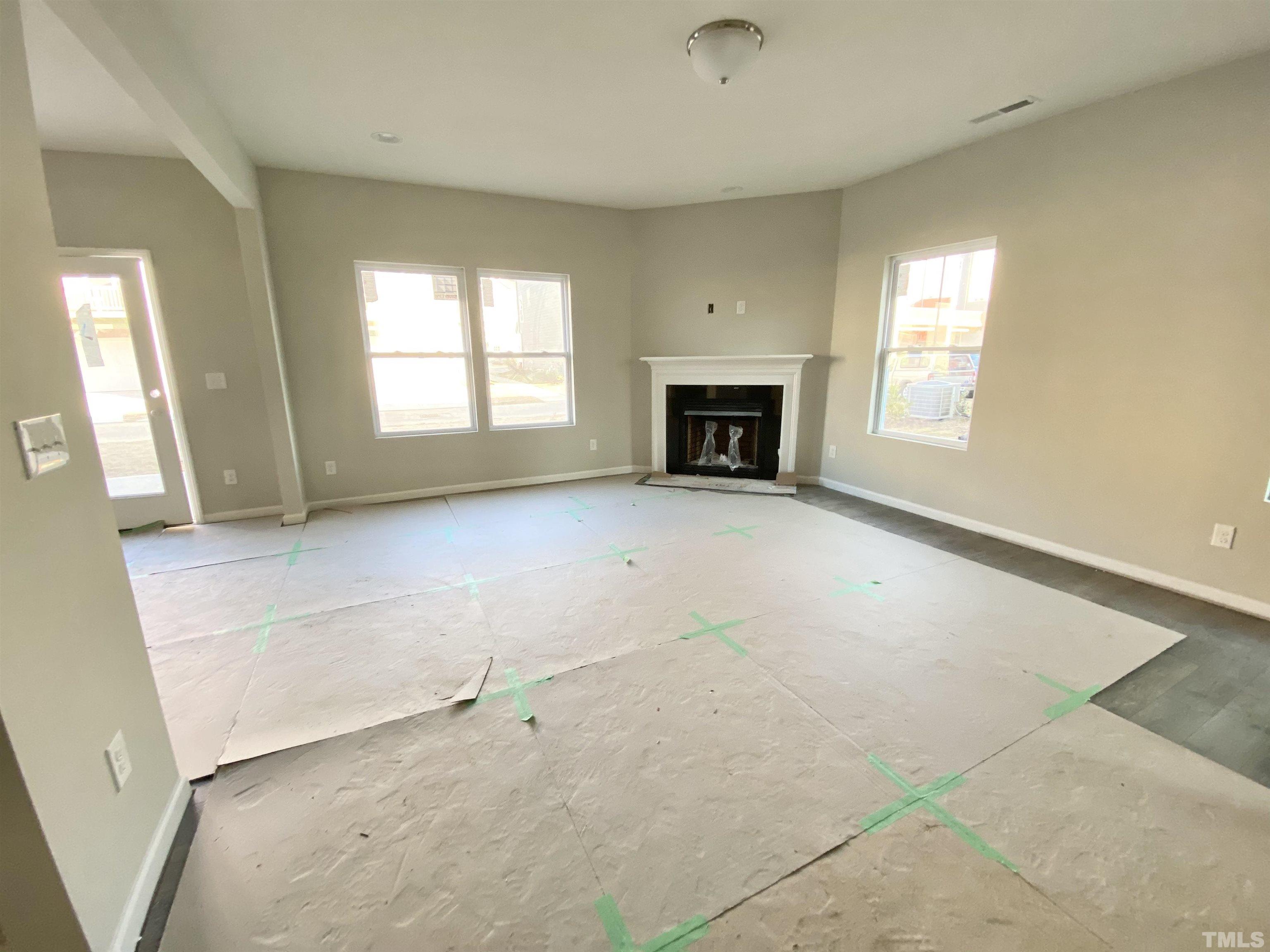 618 Metro Station Apex, NC 27502 - Photo 5 of 11 an empty room with windows