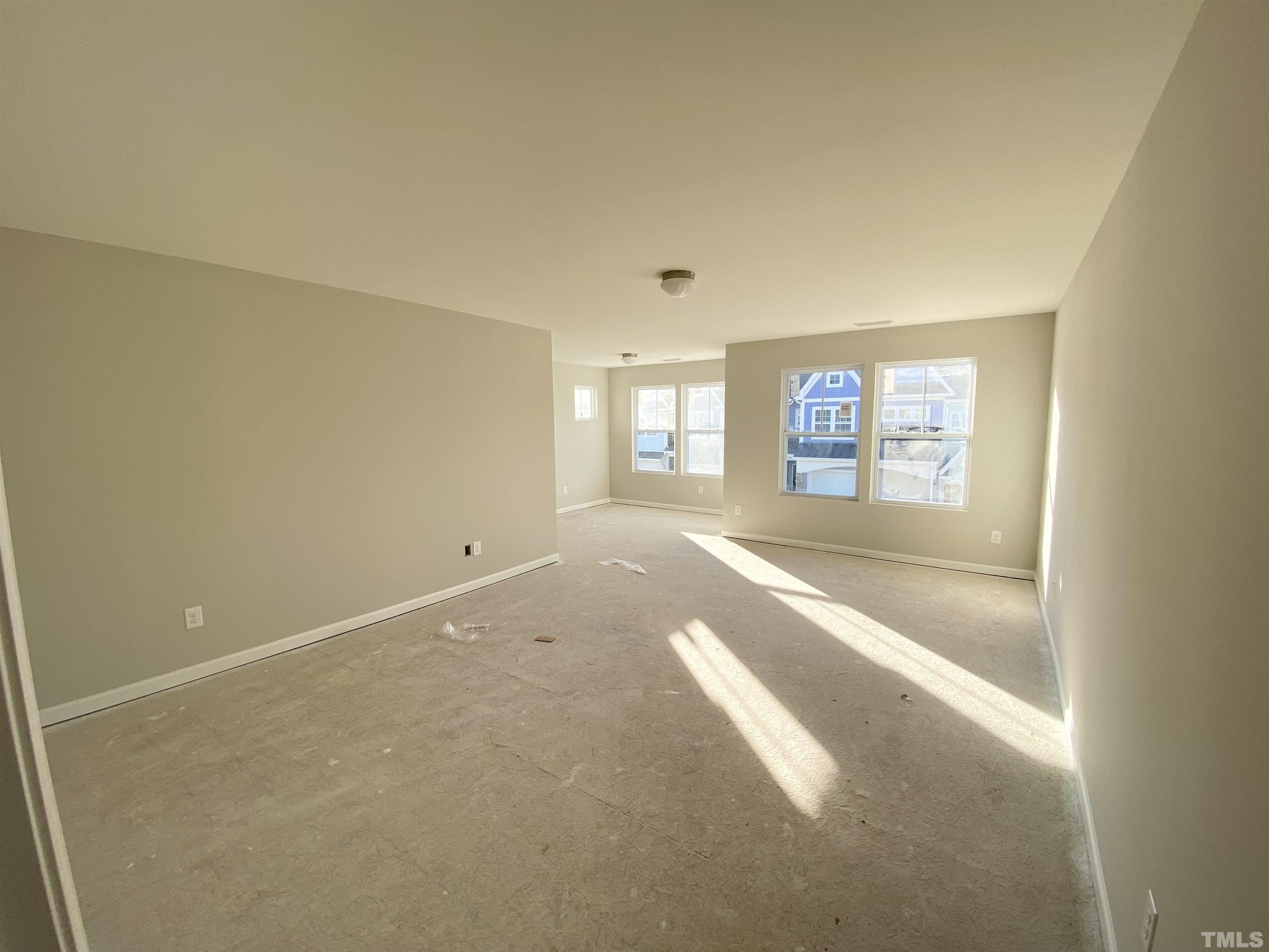 618 Metro Station Apex, NC 27502 - Photo 6 of 11 a view of an empty room with a window