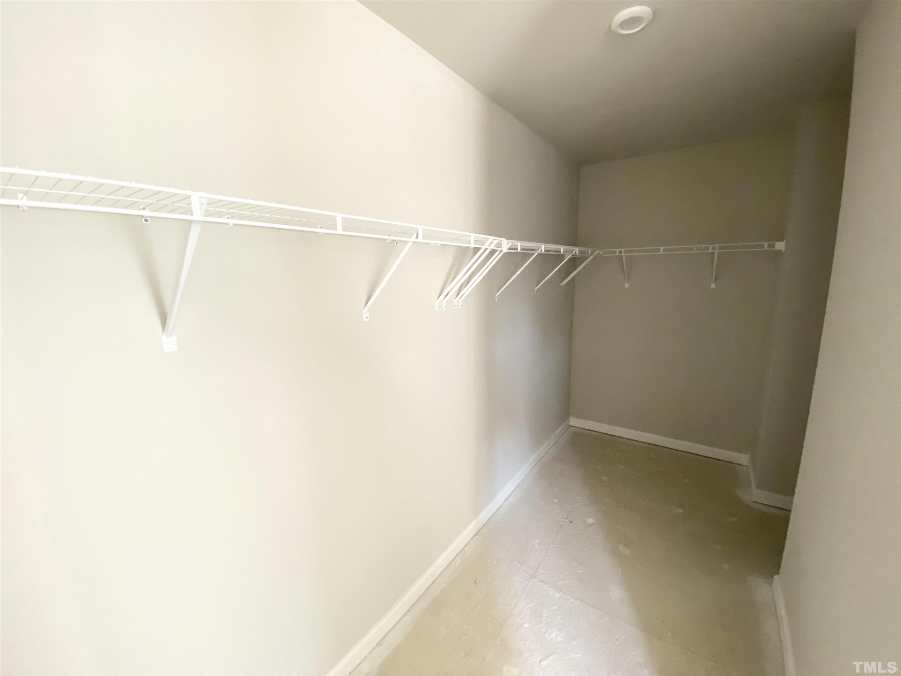 618 Metro Station Apex, NC 27502 - Photo 8 of 11 a view of a room with racks on the wall