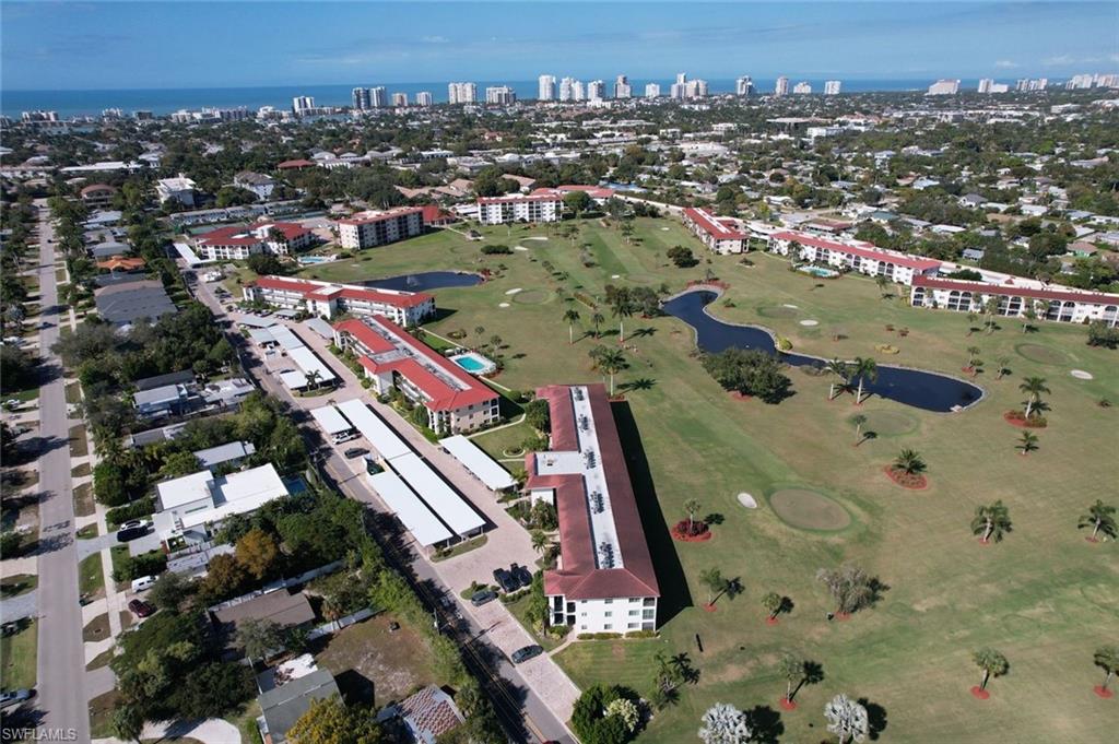 41 High Point Circle South, Unit 107 Naples, FL 34103 - Photo 3 of 29 an aerial view of a city