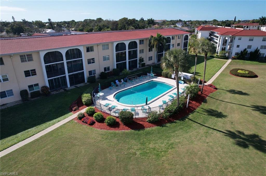 41 High Point Circle South, Unit 107 Naples, FL 34103 - Photo 5 of 29 an aerial view of a house