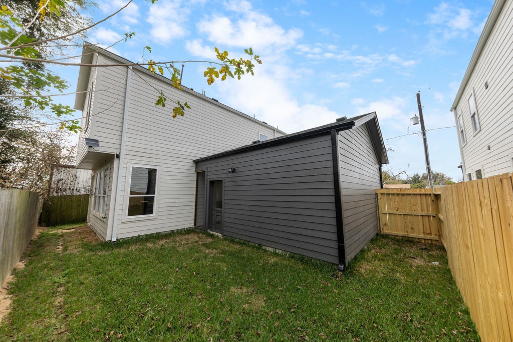 9630 Burden Street Houston, TX 77093 - Photo 16 of 16 a view of a back yard of the house
