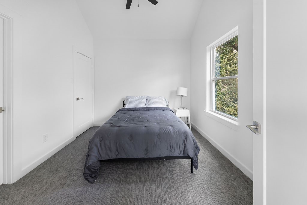 9630 Burden Street Houston, TX 77093 - Photo 9 of 16 a bedroom with a bed and window