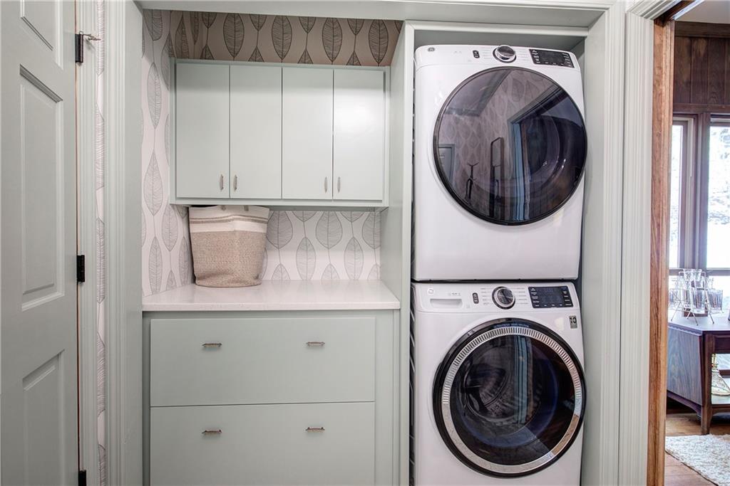 450 Little Hendricks Mountain Road Jasper, GA 30143 - Photo 26 of 61 a close view of a utility room with dryer and washer