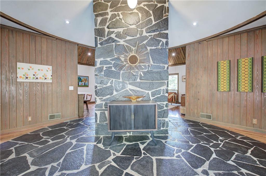 450 Little Hendricks Mountain Road Jasper, GA 30143 - Photo 3 of 61 a living room with a rug and a window