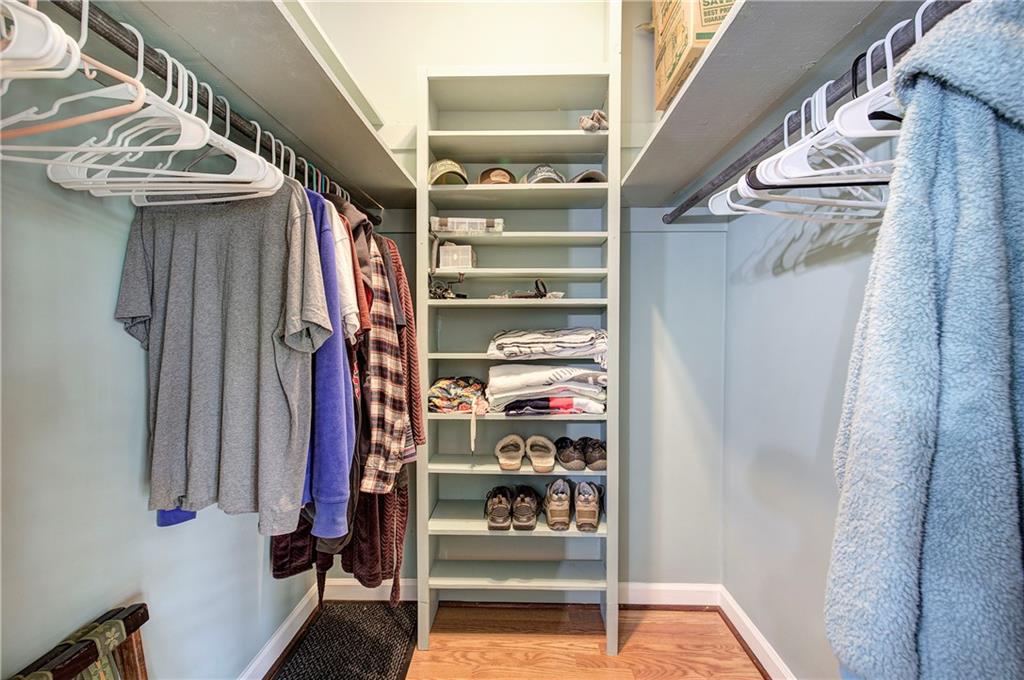 450 Little Hendricks Mountain Road Jasper, GA 30143 - Photo 33 of 61 a view of walk in closet with clothes and shoes