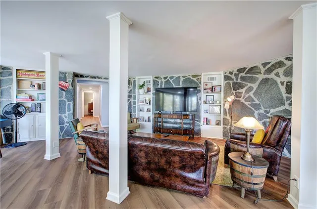 a bedroom with a bed and a lamp