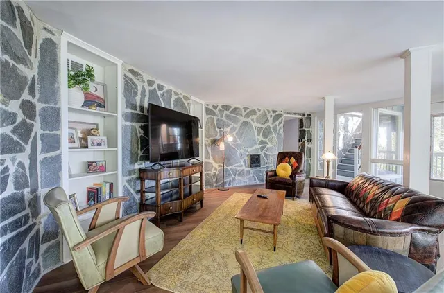 a bedroom with a bed and a lamp